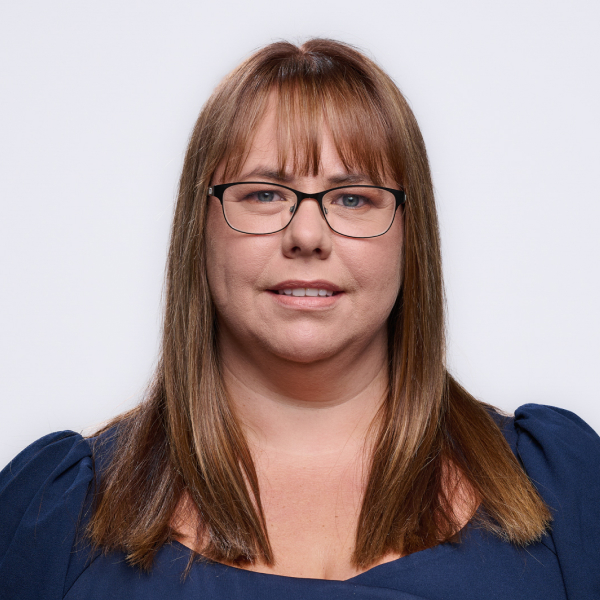 An image of Sarah Sargent wearing a blue top and glasses. She is smiling at the camera. An image of Sarah Sargent wearing a blue top and glasses. She is smiling at the camera.