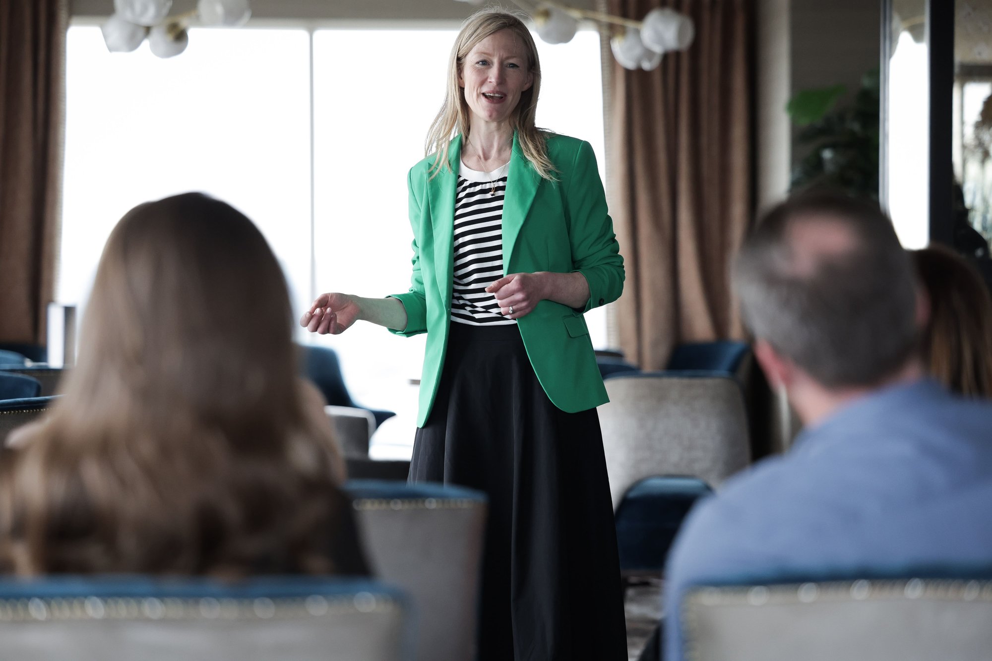 An image of an AAB employee presenting to colleagues in the Ireland office.